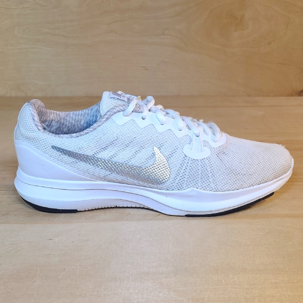 Nike Women’s White Running Shoe with Silver Swoosh